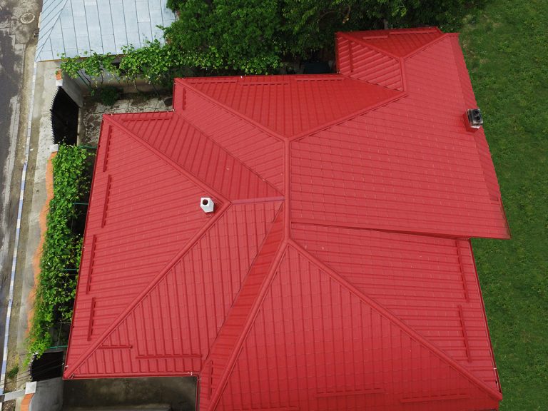 Metal-tile roof installed by Top Roofing, seen from above